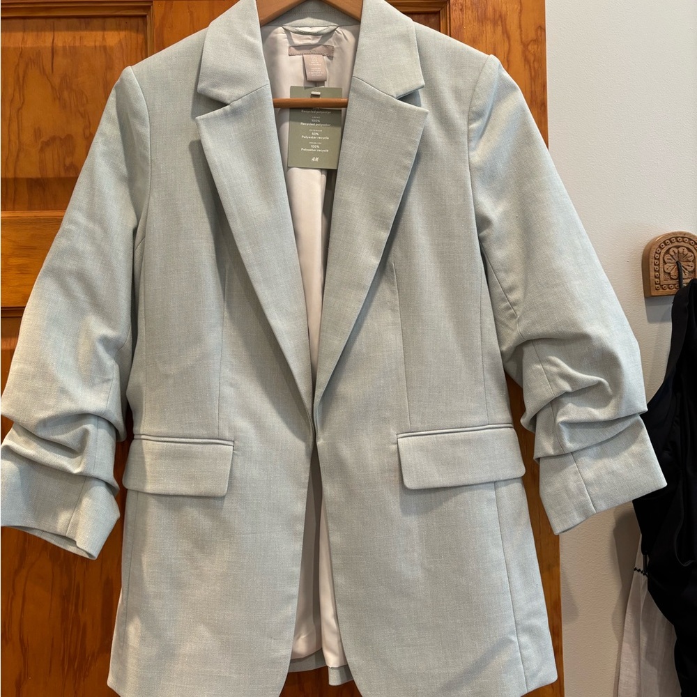 Suit jacket new with tags.